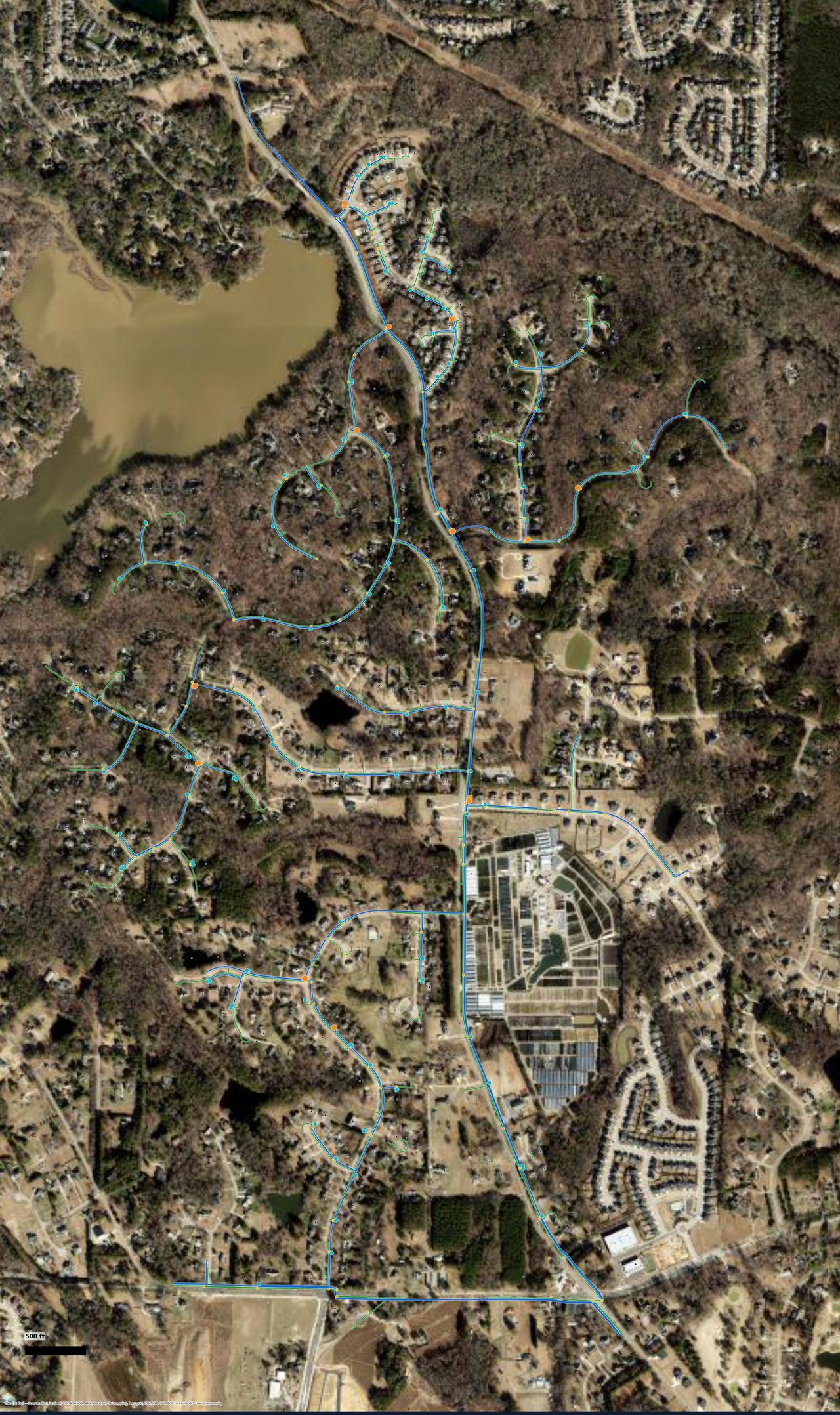 FTTH construction plan over aerial imagery: conduit and fiber routes through a 510-home suburban service area